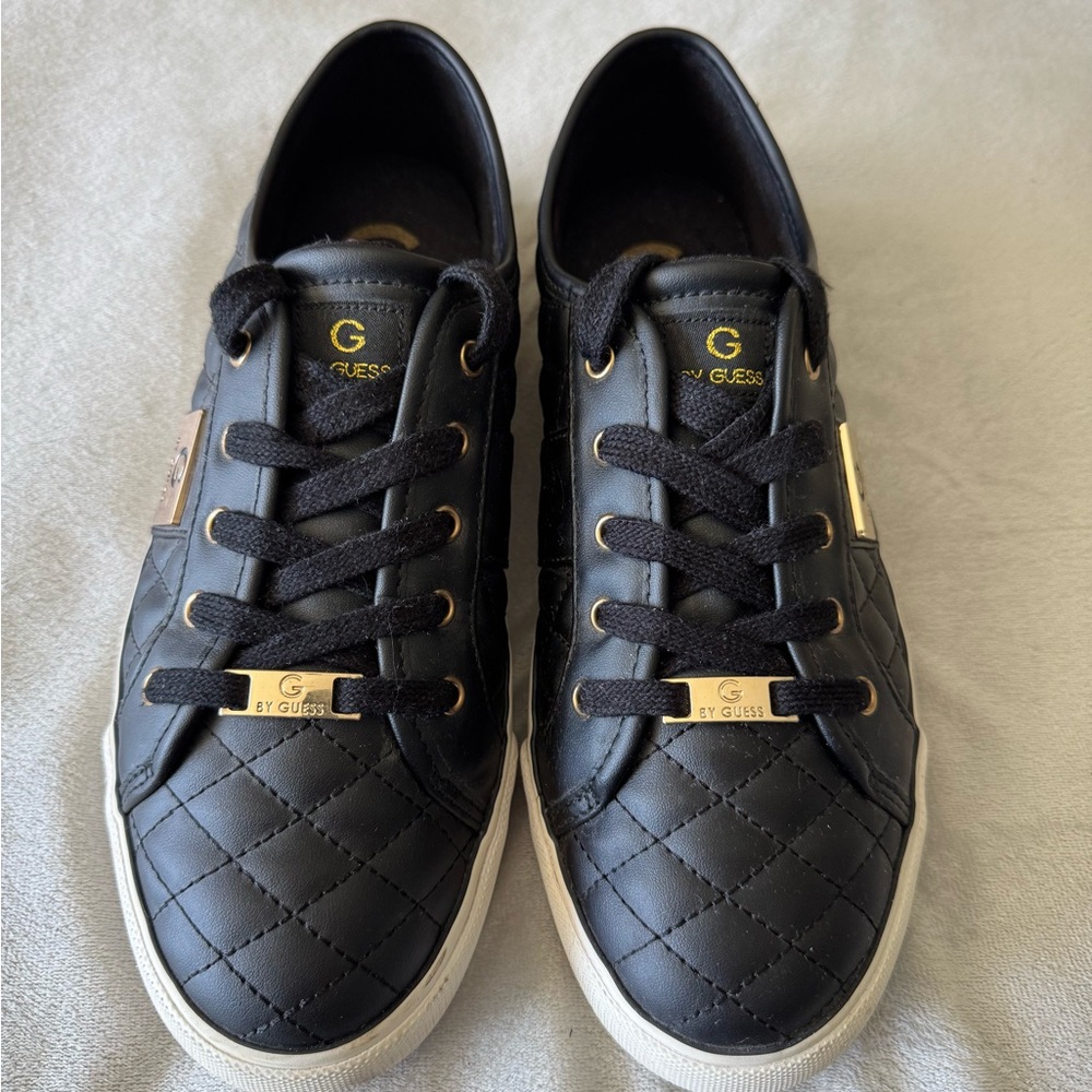 Guess Women's Black Quilted Sneakers with Gold Details